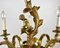 Lámpara de araña de bronce con figura de querubín para 8 puntos de luz, Francia, años 50, Imagen 6