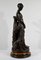 Truffot, Junge Frau mit Hund, Ende 19. Jh., Bronze 24