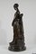 Truffot, Junge Frau mit Hund, Ende 19. Jh., Bronze 18