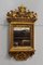 Small 19th Century Golden Wood Mirror with Winged Animal Decorations 1