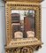 Small 19th Century Golden Wood Mirror with Winged Animal Decorations 4