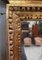 Small 19th Century Golden Wood Mirror with Winged Animal Decorations 5