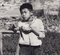 Hanna Seidel, Hong Kong Boy with Food, Black and White Photograph, 1960s 2