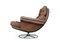 Tan Leather Armchair with Removable Cushions on a Chromed Circular Base by Bruno Mathsson for Dux 4