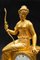 Antike Französische Empire Uhr aus gemeißelter goldener Bronze 4