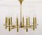 Italian Midcentury Brass Textured Glass Discs Chandelier attributed Sciolari by Gaetano Sciolari, 1970 3
