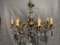 Lámpara de araña vintage con ocho ramas de cristal, años 80, Imagen 8