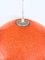 Lámpara colgante esférica de resina naranja, Italia, años 60, Imagen 9