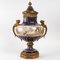Vase aus Porzellan und vergoldeter Bronze, 19. Jh. 5