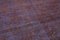 Grand tapis violet surteint 10