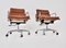 Cognacfarbene Ea 217 Soft Pad Chairs aus Leder von Charles & Ray Eames für ICF, 1970er, 2er Set 9