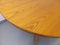 Vintage Round Dining Table in Blond Elm with Integrated Extension, 1970s 4
