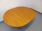 Vintage Round Dining Table in Blond Elm with Integrated Extension, 1970s 10