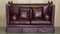 Antikes viktorianisches Knoll Sofa in Ochsenblut, 1860er 2