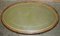 English Walnut Green Leather Brass Castor Oval Coffee Table, 1900s 11