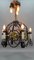 Lámpara de araña Art Déco de hierro forjado y latón con animales, años 20, Imagen 6