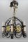 Lámpara de araña Art Déco de hierro forjado y latón con animales, años 20, Imagen 3