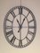 Ovale Mid-Century Uhr aus Eisen 6