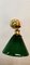 Antike Wandlampe aus Messing mit Dekoration und grünem Glas 9
