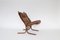 Cognacbrauner Vintage Siesta Stuhl & Fußhocker aus Leder von Ingmar Relling für Westnofa, 1960er, 2er Set 5