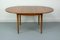 Round Teak Veneered Dining Table with Central Extension, 1960s 4