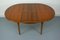 Round Teak Veneered Dining Table with Central Extension, 1960s, Image 10