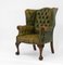Antique Leather Button Wing Back Armchair with Claw and Ball Feet, 1920s, Image 1