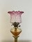 Antique Victorian Brass Oil Lamp with a Cranberry Glass Shade, 1880s 2