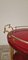 Carrello di servizio rotondo in pergamena rossa con dettagli in ottone attribuito ad Aldo Tura, Italia, anni '70, Immagine 4