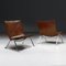 Vintage Danish PK22 Lounge Chairs in Polished Steel and Cognac Leather by Poul Kjærholm for E. Kold Christensen, 1950s, Set of 2 1