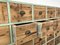 Industrieller Vintage Holzschrank mit Original Handels, 1930er 5