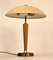 Swedish Grace Period Brass and Oakwood Table Lamp by Böhlmarks, 1920s 4