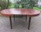 Round Rosewood Table with Integrated Extension, 1970s 5