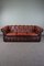 Curved Red Leather Chesterfield Sofa 1