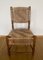Rustikaler nordamerikanischer Vintage Holzstuhl mit geflochtener Rückenlehne und Sitzfläche 3