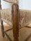 Rustikaler nordamerikanischer Vintage Holzstuhl mit geflochtener Rückenlehne und Sitzfläche 12
