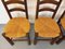 Brutalistische Vintage Esszimmerstühle aus Holz & Stroh von Georges Robert, 1960er, 4er Set 6