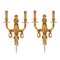 Gilded Sconces with Currency Curls Surmounted Cherubs, Set of 2 1