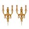 Gilded Sconces with Currency Curls Surmounted Cherubs, Set of 2 1