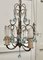 French Turquoise Crystal and Brass Chandelier, 1920s 1