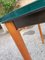 Mesa con estructura de hierro, patas de madera y tablero de vidrio al estilo de Lc10 Le Corbusier de Cassina, años 80, Imagen 6