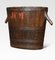 Oval-Shaped Log Bin with Oak Frame and Iron Bands 2