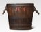 Oval-Shaped Log Bin with Oak Frame and Iron Bands 1