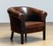 Dutch Patinated Dark Brown Colonial Sheepskin Upholstered Lounge Club Chair, 1960s, Image 1