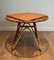 Runder Trampolin Couchtisch aus Rattan, 1950er 11