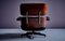 Früher Modell 670 Sessel und 671 Fußhocker aus Palisander von Charles & Ray Eames für Herman Miller, 1960er, 2er Set 12