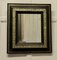 French Empire Gilt Brass and Black Lacquer Wall Mirror, Image 1