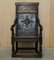 17th Century English Jacobean Hand Carved Oak Armchair with Tudor Panelling, Image 2