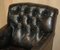 Chesterfield Bridgewater Black Leather Armchair from Howard & Sons, 1880s 4