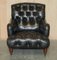 Chesterfield Bridgewater Black Leather Armchair from Howard & Sons, 1880s 2